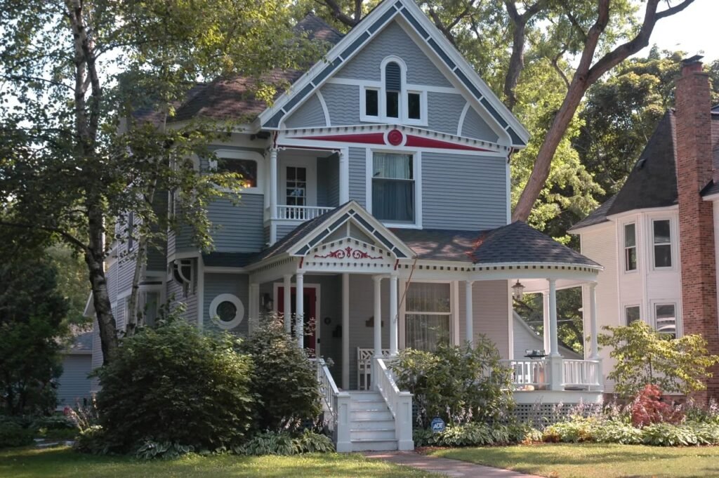 A restored Victorian home on a tree-lined street in a Northern Michigan town